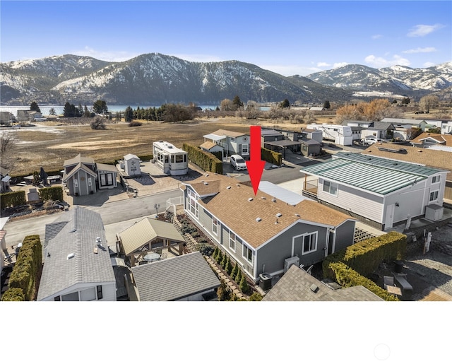 bird's eye view featuring a residential view and a mountain view