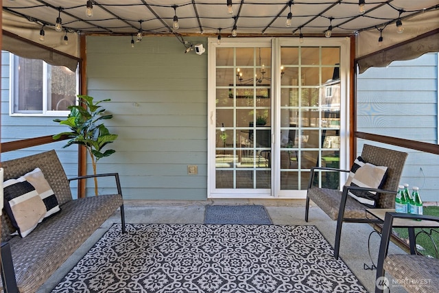 balcony featuring an outdoor living space and a patio