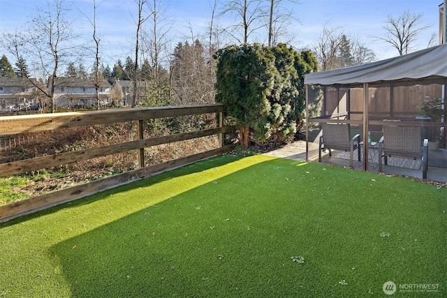 view of yard with fence