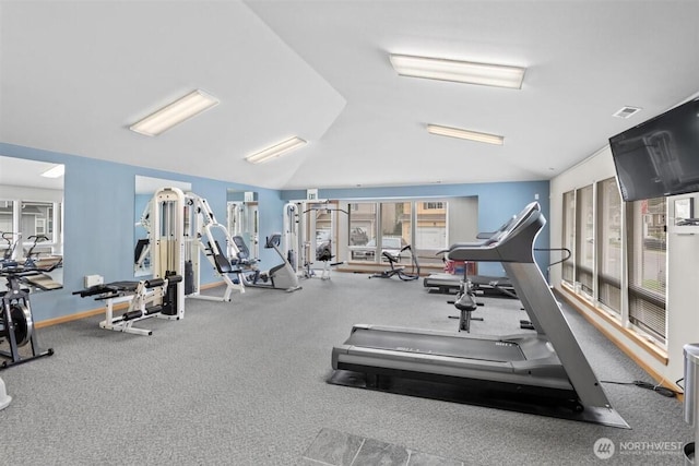 workout area featuring baseboards