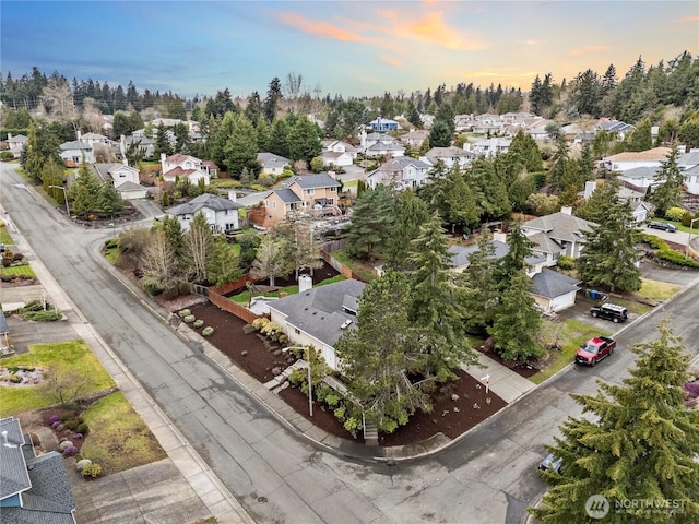 aerial view at dusk with a residential view