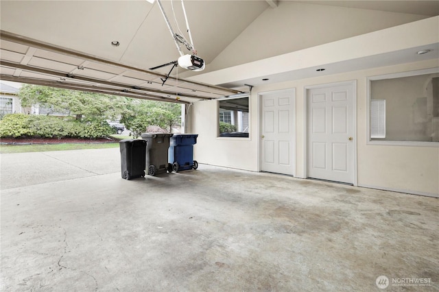 garage featuring a garage door opener