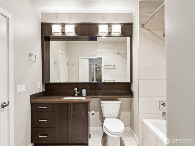 full bath featuring baseboards, vanity, and toilet