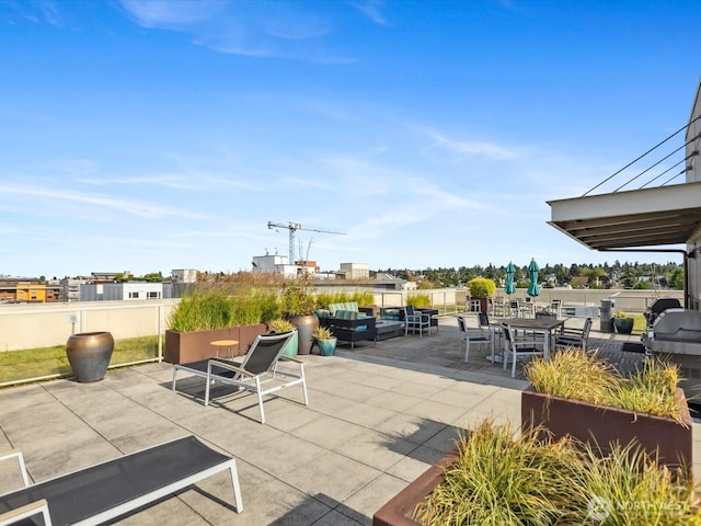 view of patio with fence and an outdoor hangout area