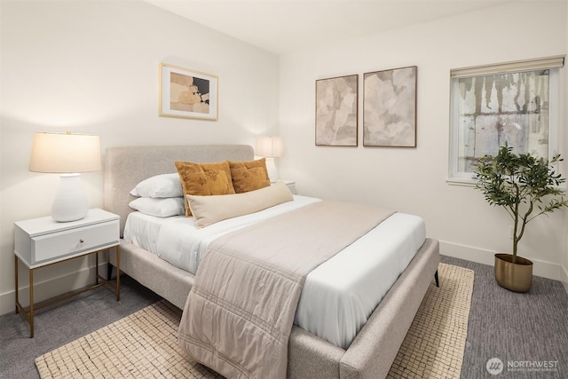 carpeted bedroom with baseboards