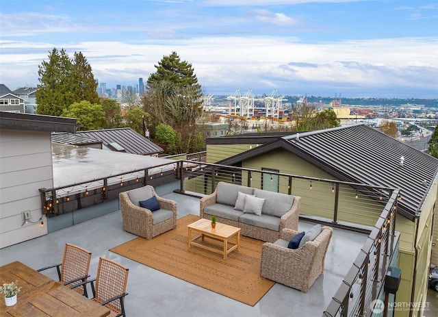 view of patio / terrace with a view of city and an outdoor living space