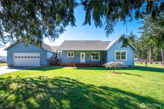 ranch-style house featuring covered porch, driveway, a front yard, and fence