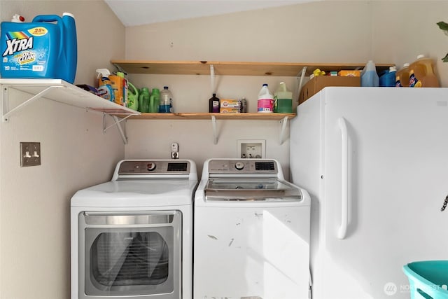 laundry room with laundry area and washing machine and dryer