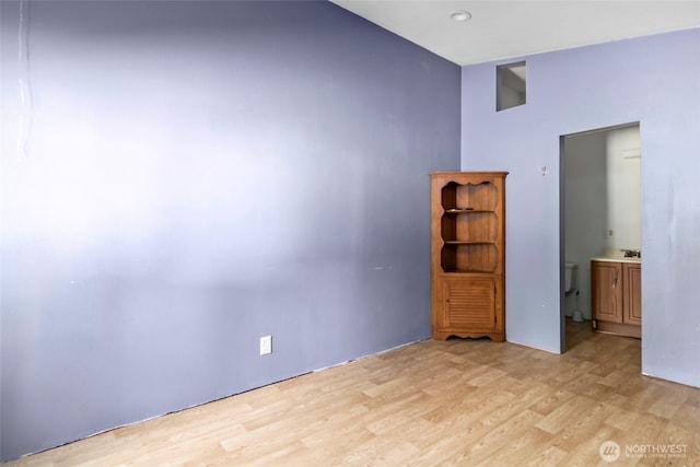 unfurnished room featuring light wood finished floors