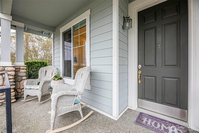 doorway to property with a porch