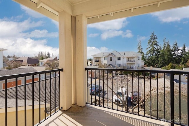 balcony featuring a residential view