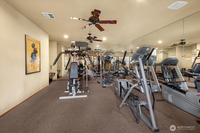 exercise room with visible vents, ceiling fan, and baseboards