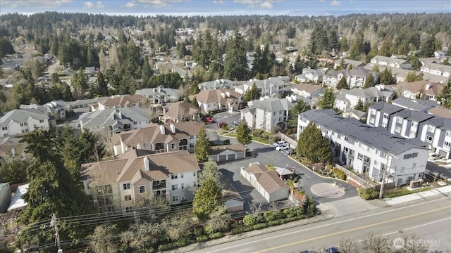 birds eye view of property with a residential view