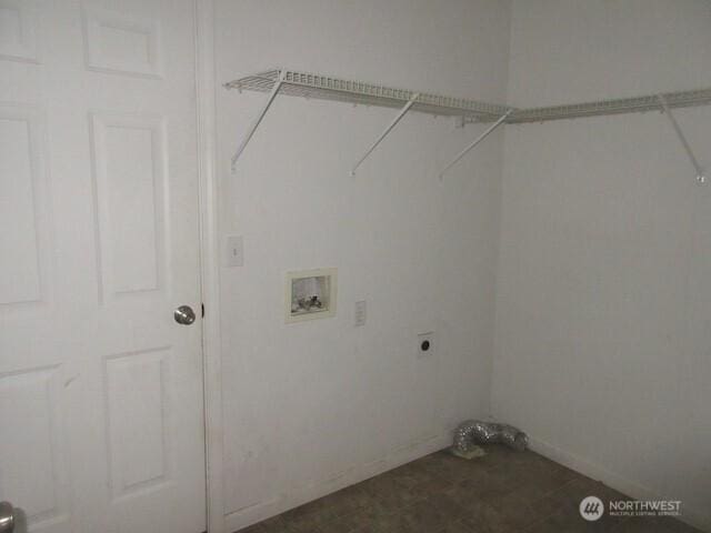 clothes washing area with washer hookup, laundry area, and hookup for an electric dryer