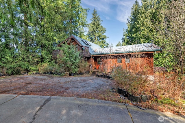 view of front of house featuring metal roof