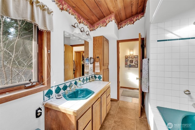 14120 139th Ave SE, Snohomish, WA 98290 - bathroom with wooden ceiling, tile patterned flooring, vanity, and a tub