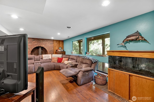 14120 139th Ave SE, Snohomish, WA 98290 - living area with recessed lighting, a wood stove, and wood finished floors