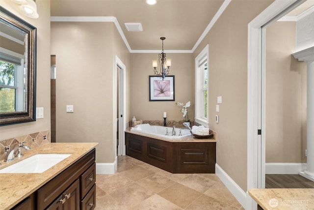 bathroom with vanity, baseboards, ornamental molding, a bath, and an inviting chandelier