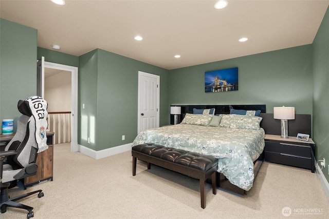 bedroom featuring baseboards, light colored carpet, and recessed lighting
