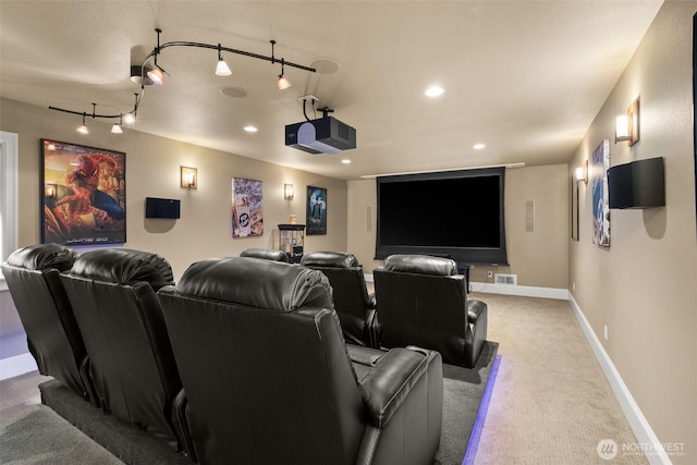 cinema featuring recessed lighting, carpet floors, visible vents, baseboards, and rail lighting