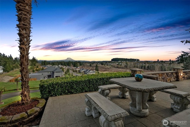 view of patio terrace at dusk