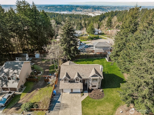 aerial view with a wooded view