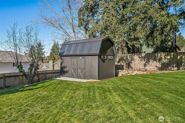 view of shed featuring a fenced backyard