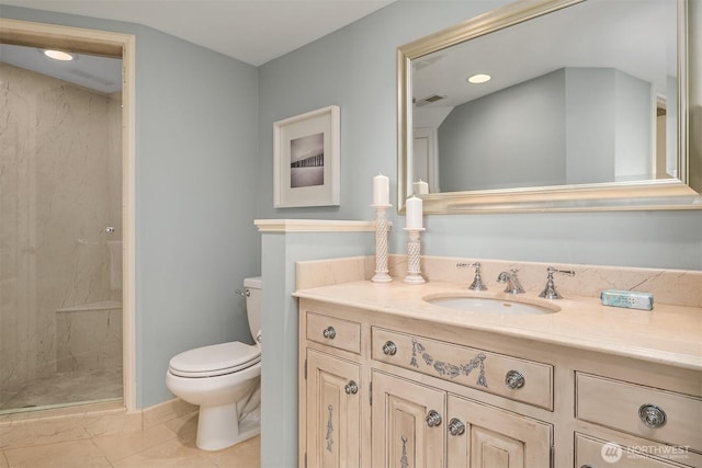 bathroom featuring tile patterned flooring, toilet, visible vents, vanity, and a stall shower