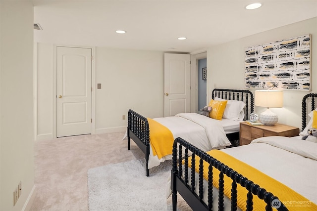 bedroom with recessed lighting, light colored carpet, visible vents, and baseboards