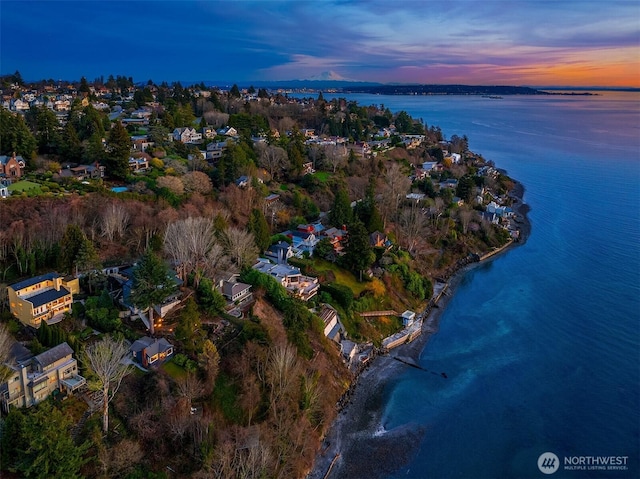 drone / aerial view featuring a water view