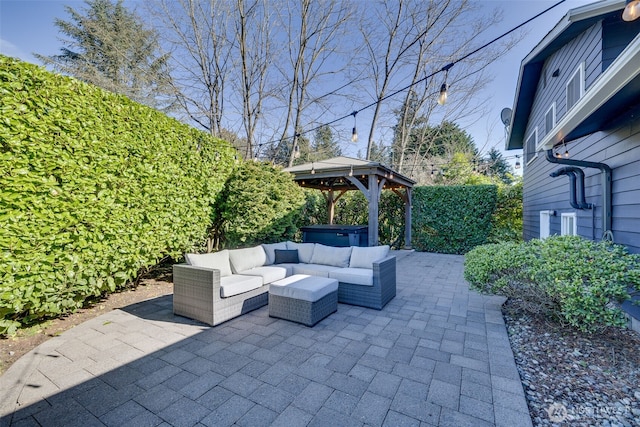 view of patio / terrace featuring outdoor lounge area and a gazebo