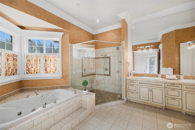 bathroom featuring a jetted tub, crown molding, a shower stall, and vanity