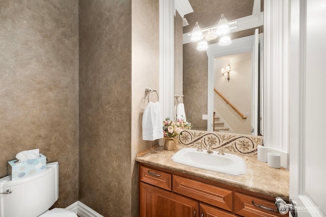 bathroom with vanity and toilet