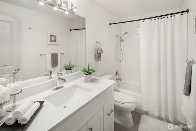 full bathroom featuring shower / tub combo, vanity, and toilet