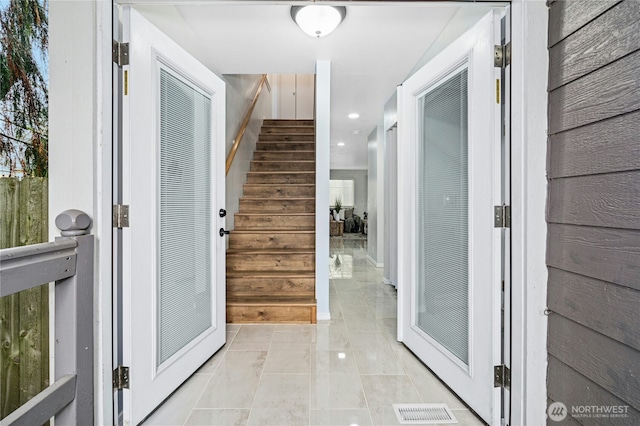 interior space featuring recessed lighting, stairway, visible vents, and light tile patterned floors