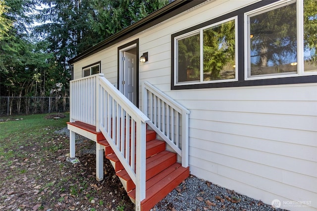 property entrance featuring fence