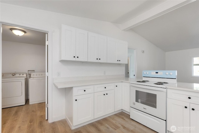 kitchen featuring white cabinetry, washer and dryer, light countertops, light wood-type flooring, and white electric range oven