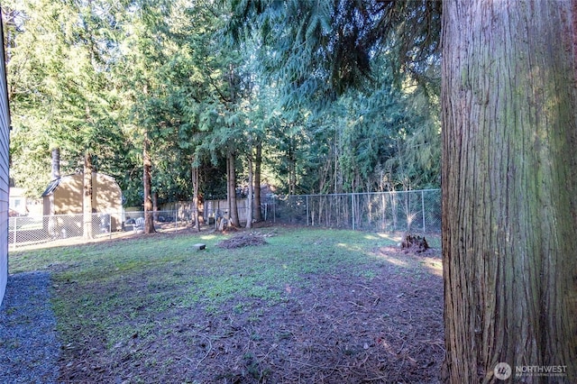 view of yard with a fenced backyard