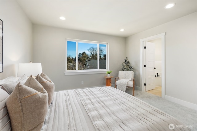 bedroom featuring light carpet, baseboards, and recessed lighting