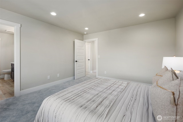 bedroom with recessed lighting, light carpet, and baseboards