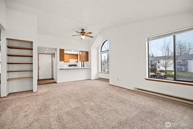 unfurnished living room with a baseboard heating unit, ceiling fan, lofted ceiling, and light colored carpet