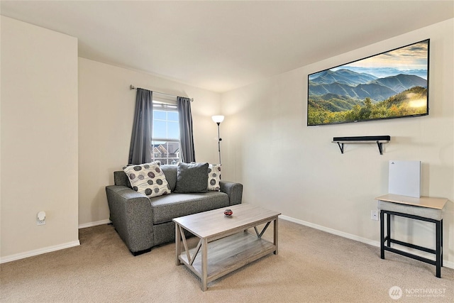 living room with light carpet and baseboards