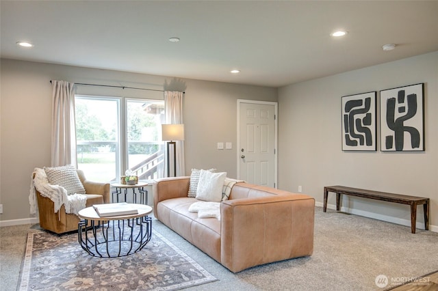 living area featuring carpet floors, recessed lighting, and baseboards