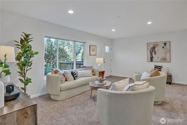 living area with carpet floors, recessed lighting, and baseboards