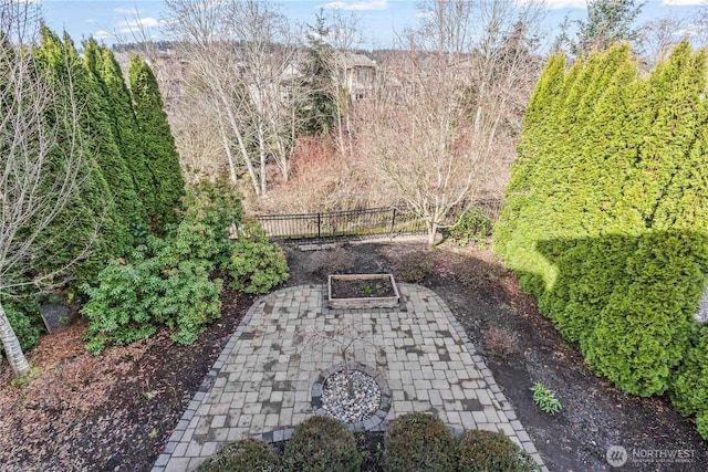 view of yard featuring a patio area and fence