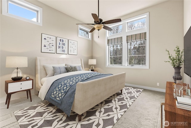 bedroom with baseboards and carpet flooring