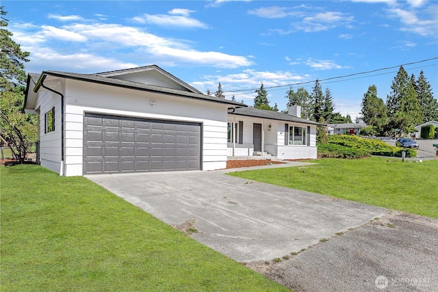 ranch-style house with an attached garage, driveway, and a front lawn