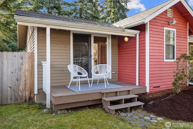 deck with french doors and fence