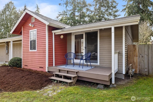 exterior space with a garage and fence