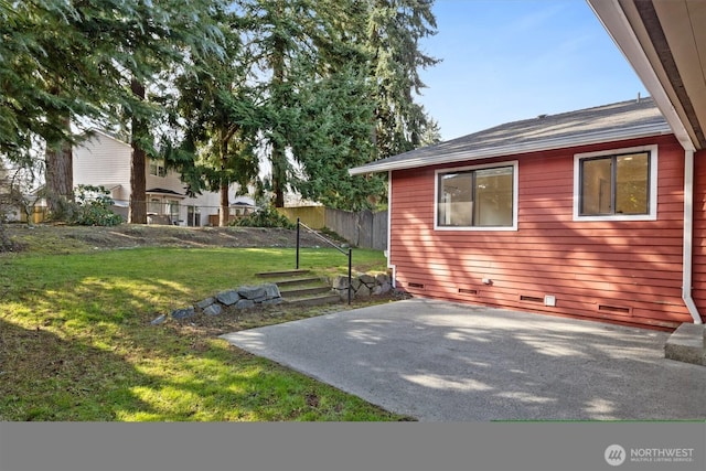 view of yard with a patio area and fence